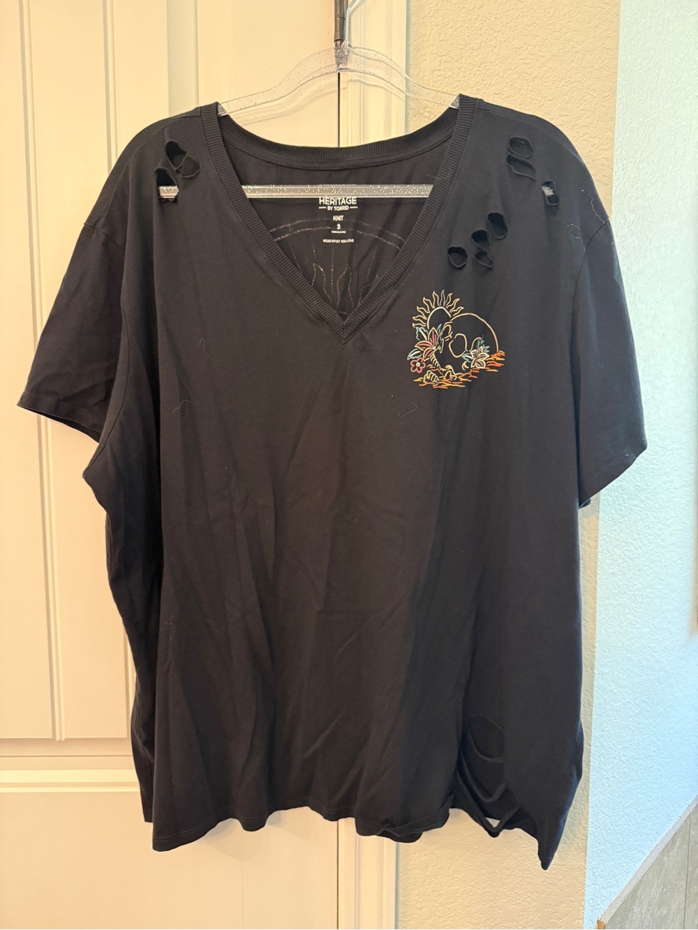 torrid Black Distressed V-Neck Tee with Floral Skull Accent